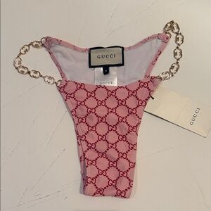 Gucci Women's size medium Swim bottoms with double GG chain accent.